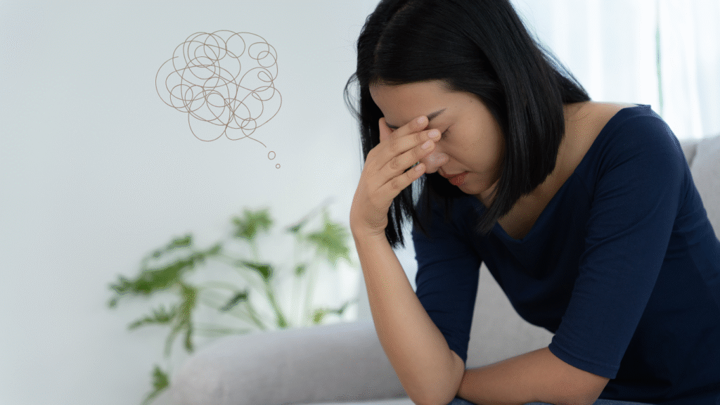 体調不良で悩む女性